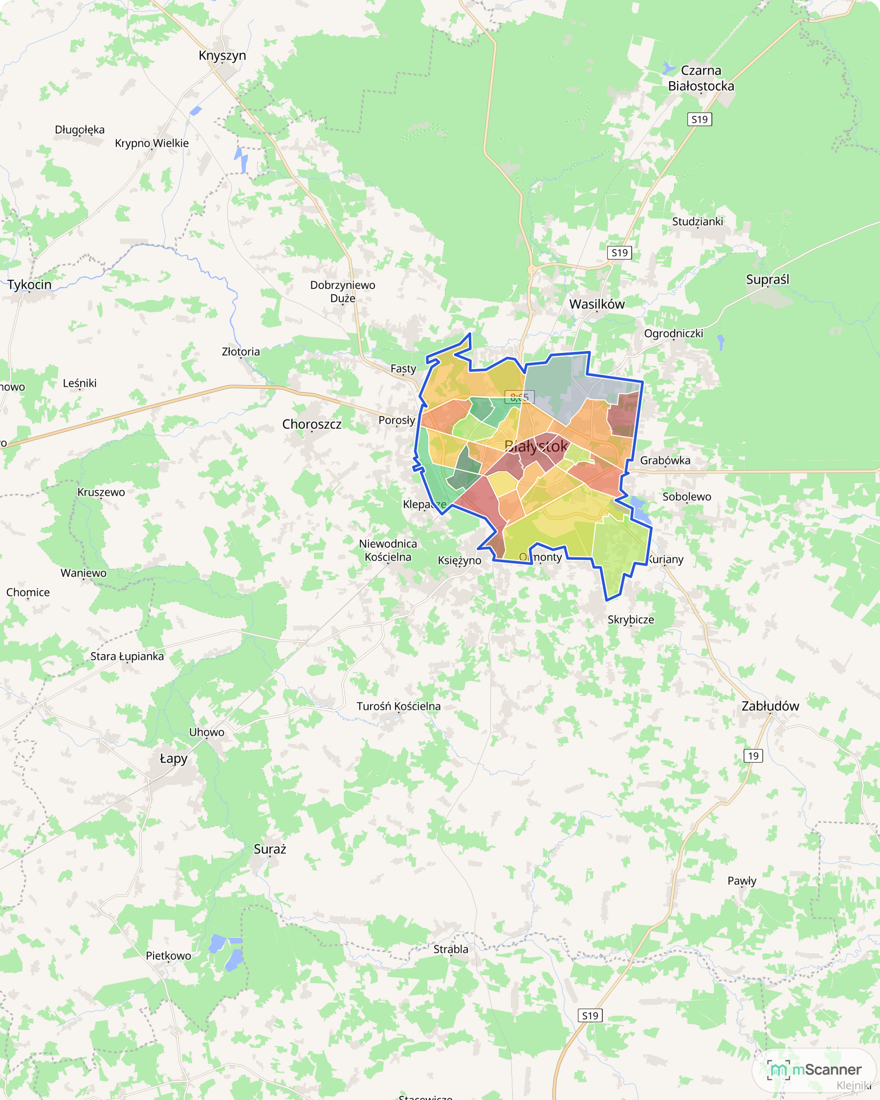Mapa Białegostoku z niebieską granicą administracyjną i osiedlami pokolorowanymi według mediany ceny transakcyjnej mieszkań, otoczona nazwami miejscowości obwarzanka: Choroszczy, Porosłów, Klepaczy, Wasilkowa, Grabówki i Czarnej Białostockiej