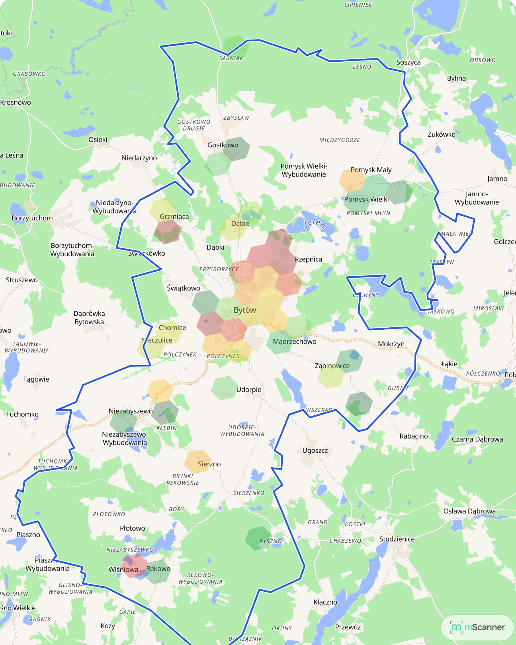 Mapa gminy Bytów z niebieską granicą administracyjną i siatką sześciokątów pokolorowanych według mediany ceny transakcyjnej, na Pojezierzu Bytowskim