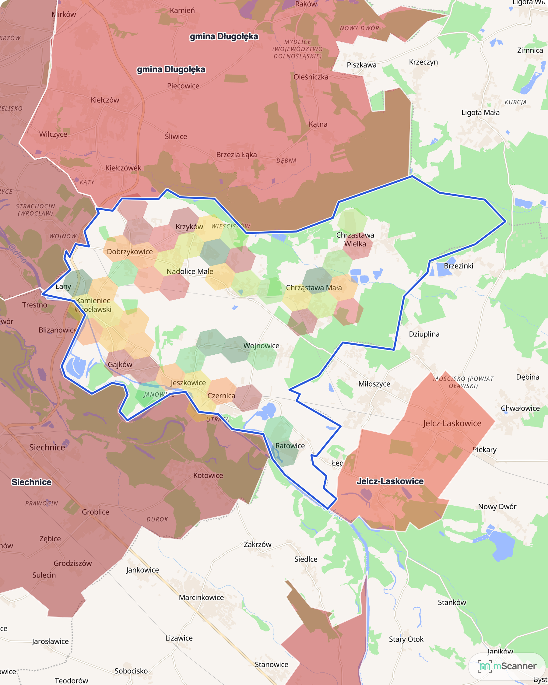 Mapa cen transakcyjnych mieszkań w gminie Czernica, z niebieskim obrysem granic i kolorowanymi obszarami cen.