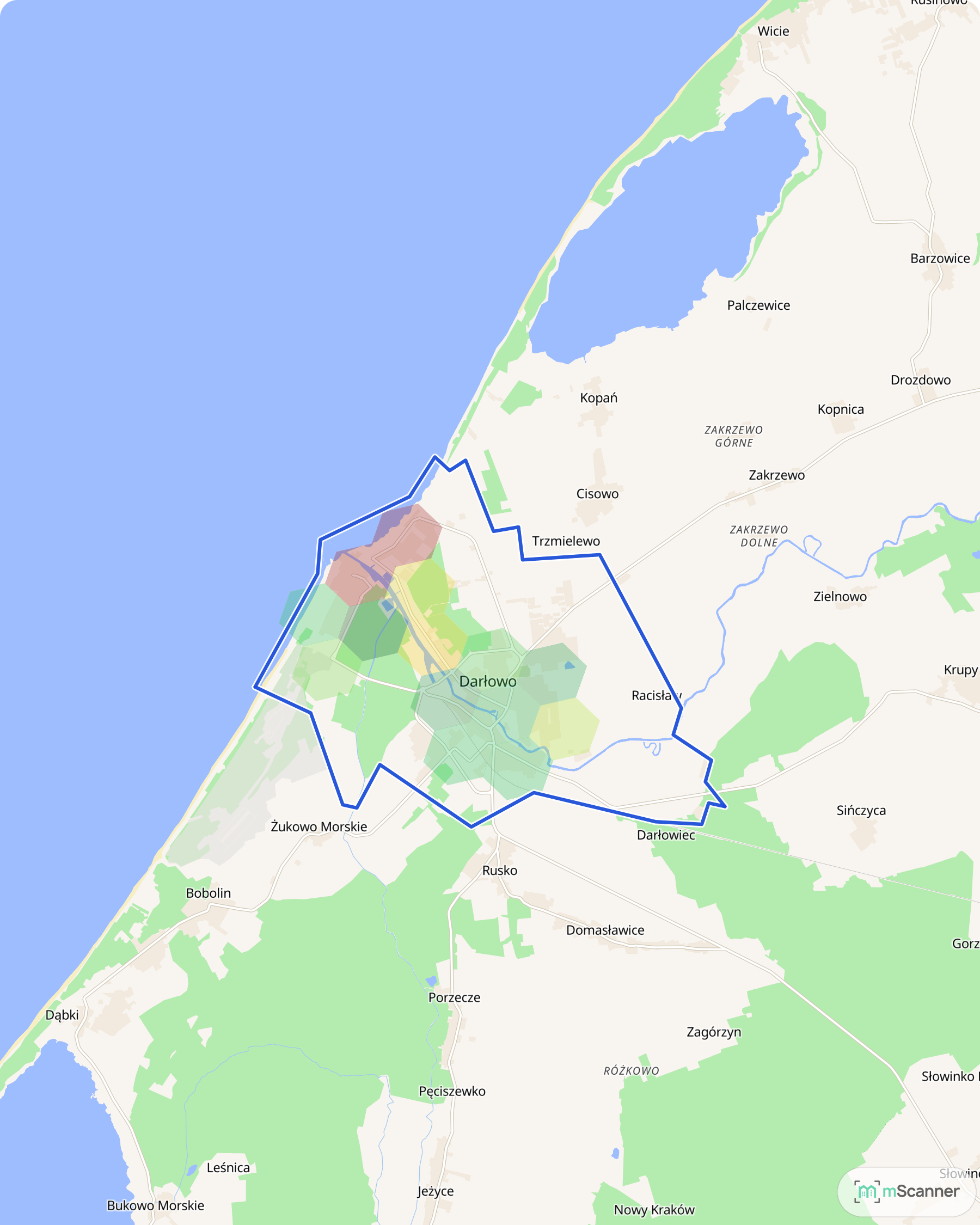 Mapa cen transakcyjnych mieszkań w Darłowie, z niebieskim obrysem granic i kolorowanymi obszarami cen.
