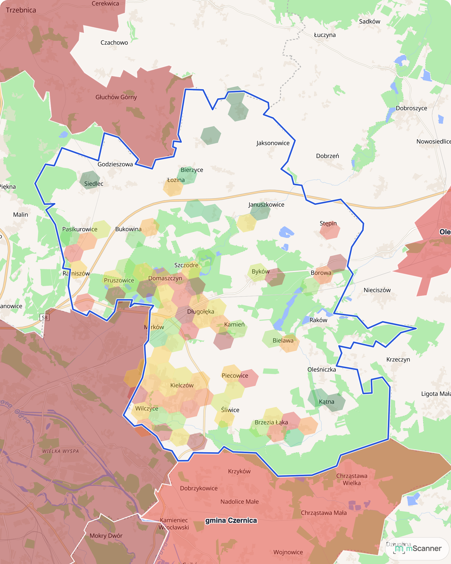 Mapa cen transakcyjnych mieszkań w gminie Długołęka, z niebieskim obrysem granic i kolorowanymi obszarami cen.