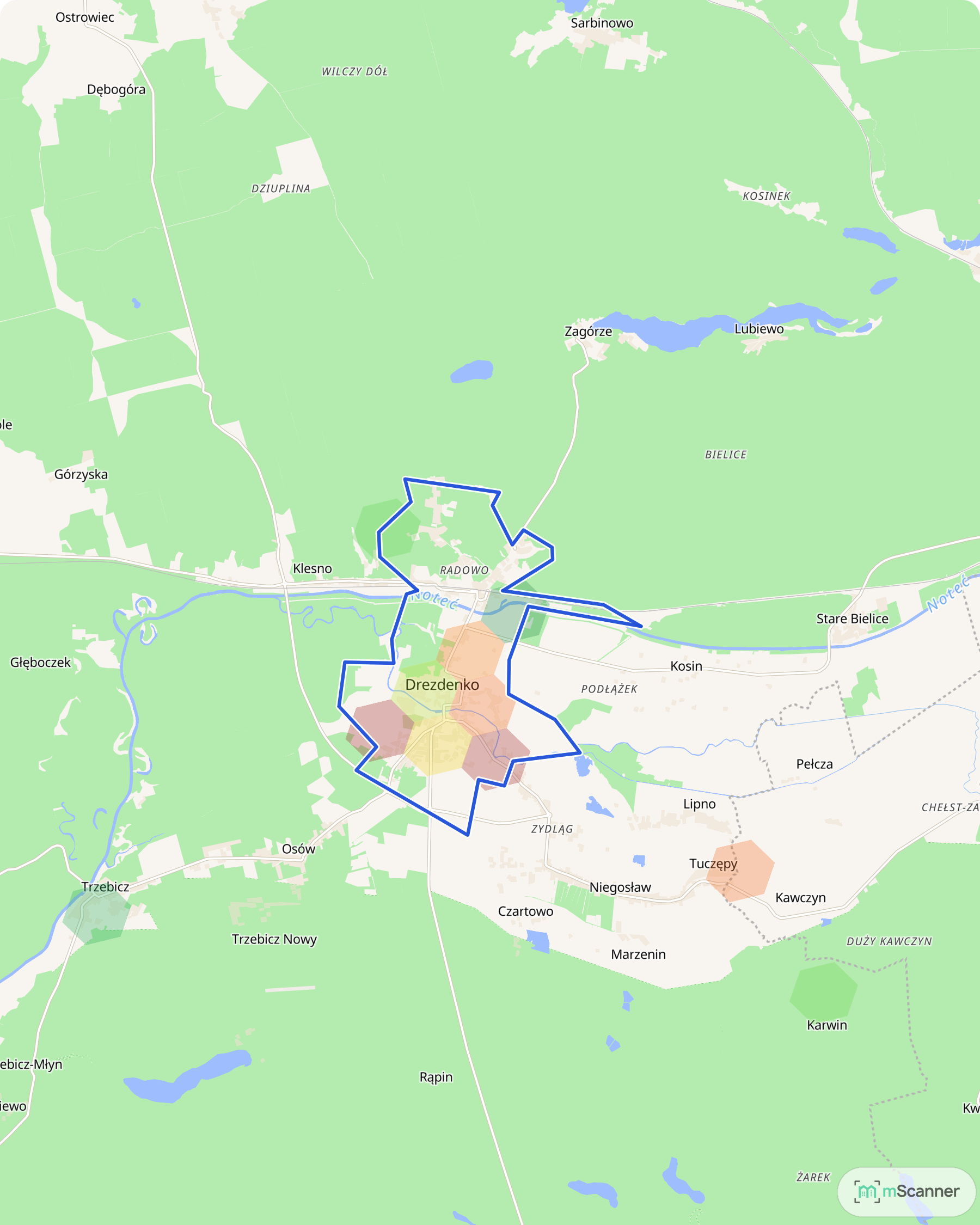 Mapa cen transakcyjnych mieszkań w Drezdenku, z niebieskim obrysem granic gminy i kolorowymi polami cen skupionymi w zabudowanej części miasta.