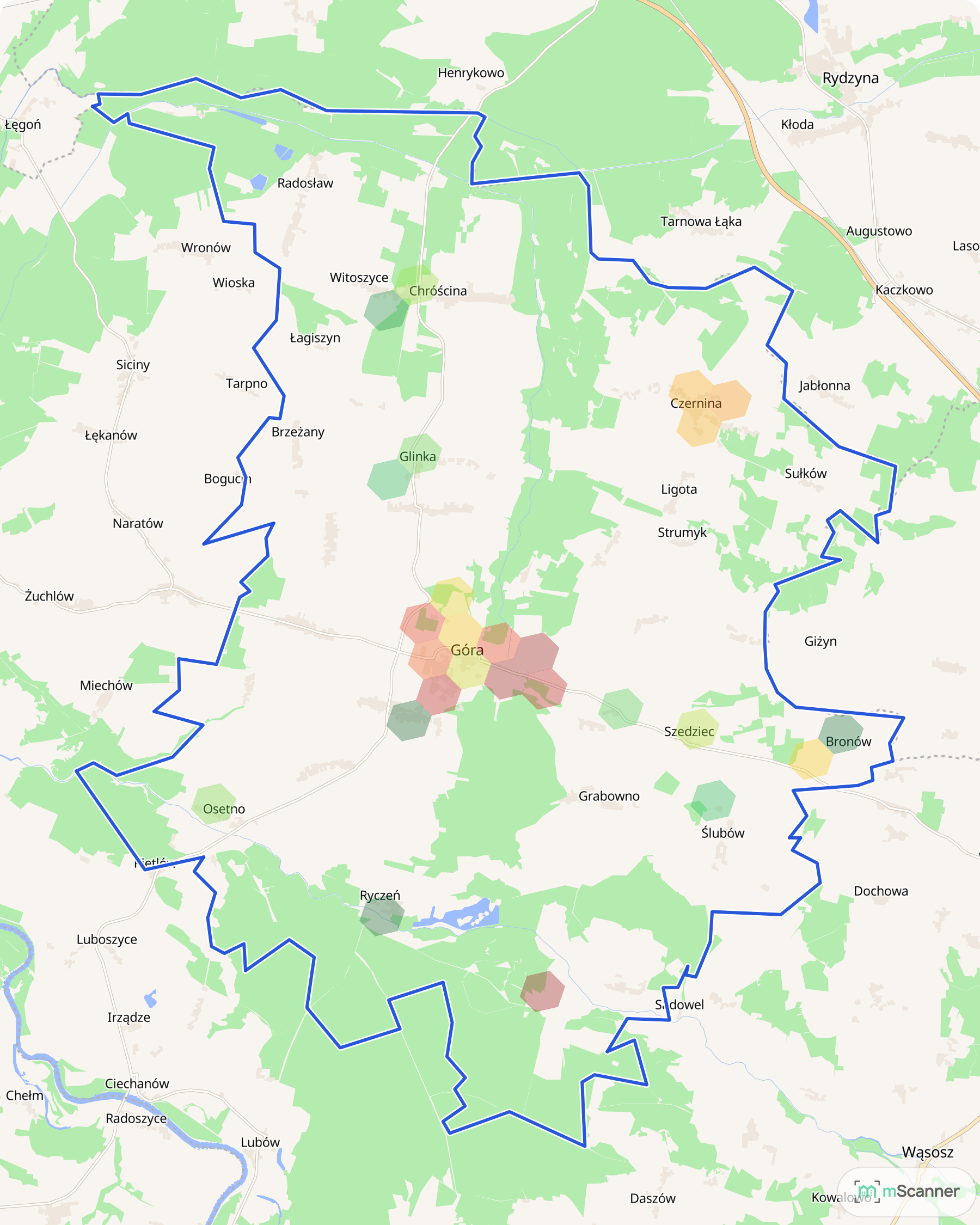 Mapa cen transakcyjnych mieszkań w gminie Góra, z niebieskim obrysem granic i kolorowanymi obszarami cen.