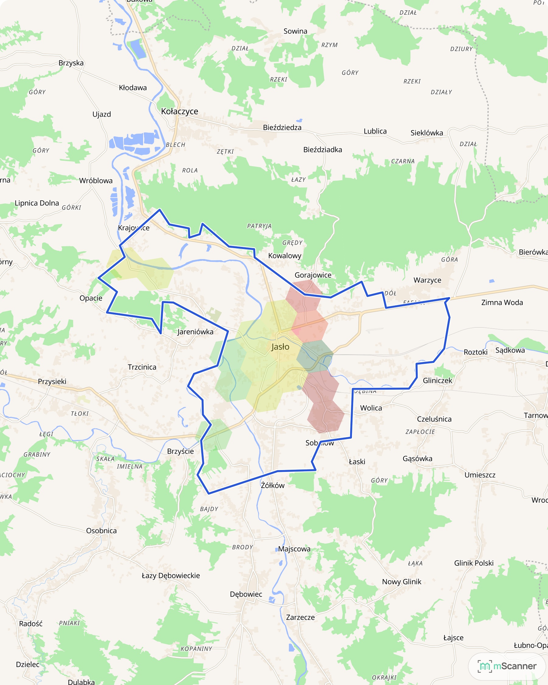 Mapa Jasła z niebieską granicą administracyjną i sześciokątami pokolorowanymi według mediany ceny transakcyjnej mieszkań, u zbiegu Wisłoki, Ropy i Jasiołki