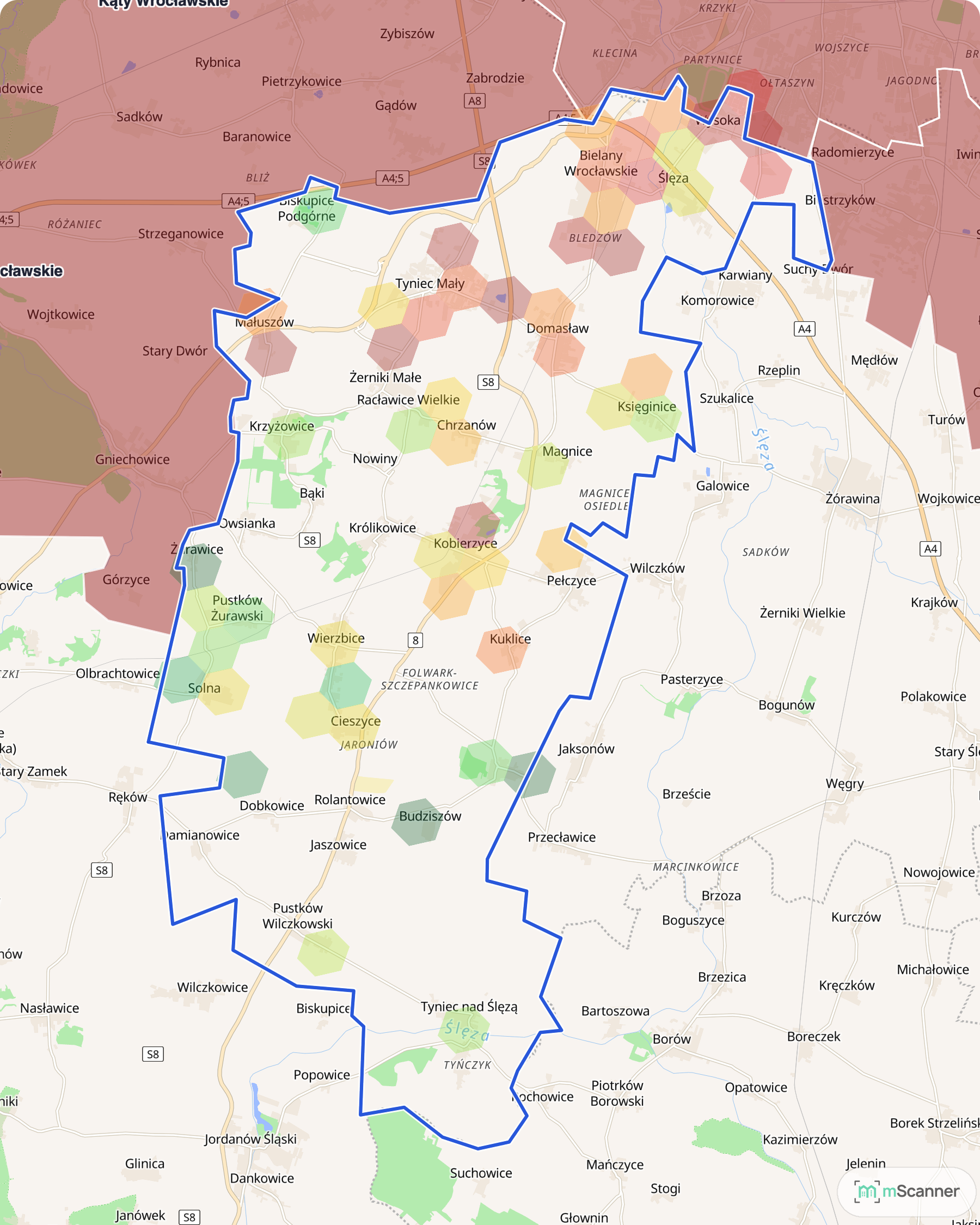 Mapa cen transakcyjnych mieszkań w gminie Kobierzyce, z niebieskim obrysem granic i kolorowanymi obszarami cen.