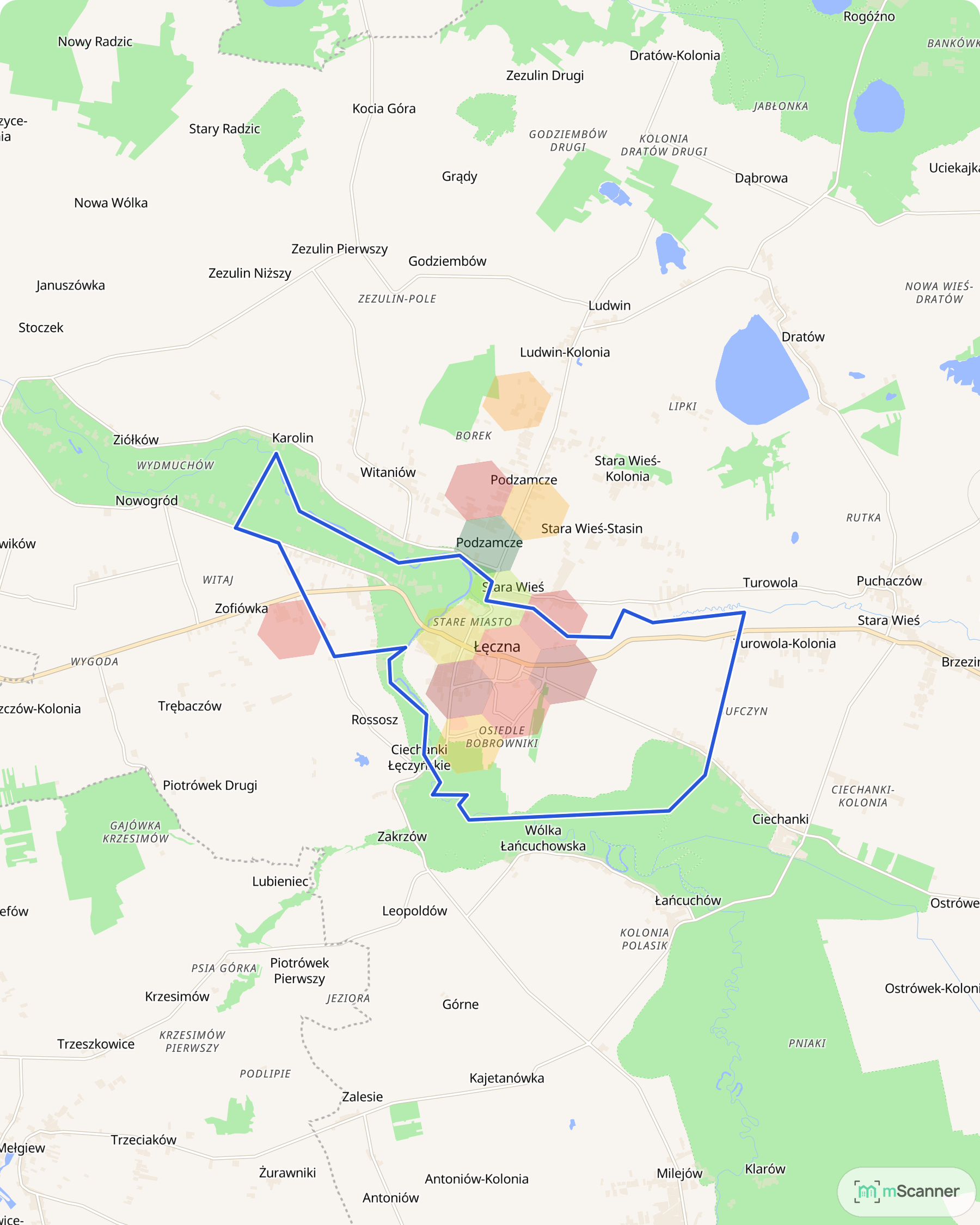 Mapa cen transakcyjnych mieszkań w Łęcznej, z niebieskim obrysem granic gminy i kolorowymi polami cen skupionymi na osiedlach z wielkiej płyty.