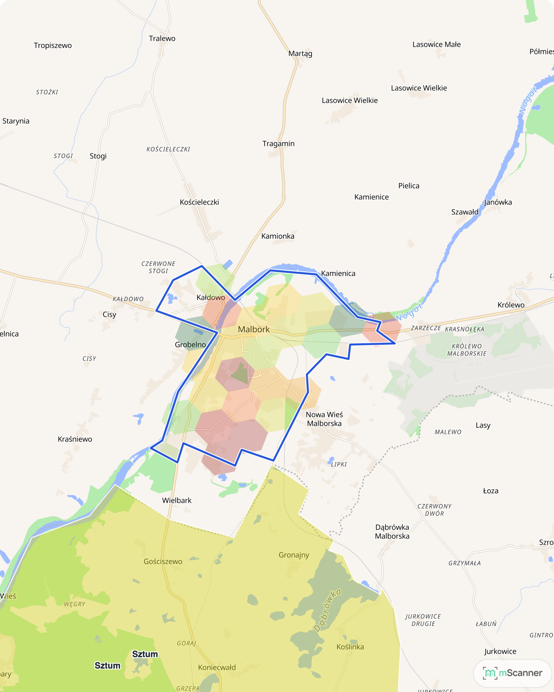 Mapa Malborka z niebieską granicą administracyjną miasta i siatką sześciokątów pokolorowanych według mediany ceny transakcyjnej, nad Nogatem