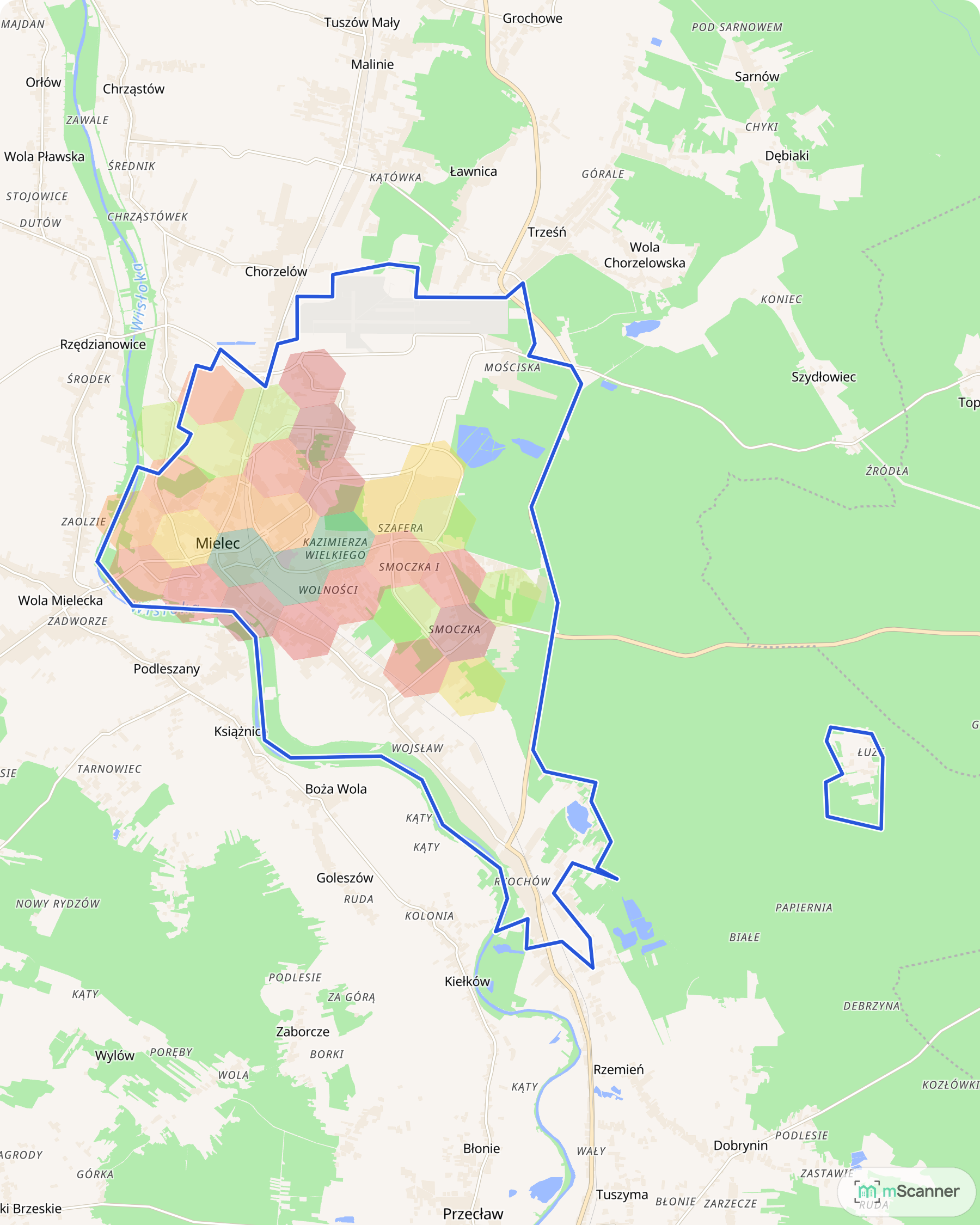 Mapa Mielca z niebieską granicą administracyjną i sześciokątami pokolorowanymi według mediany ceny transakcyjnej mieszkań, z najdroższym pasem w rejonie ulicy Racławickiej