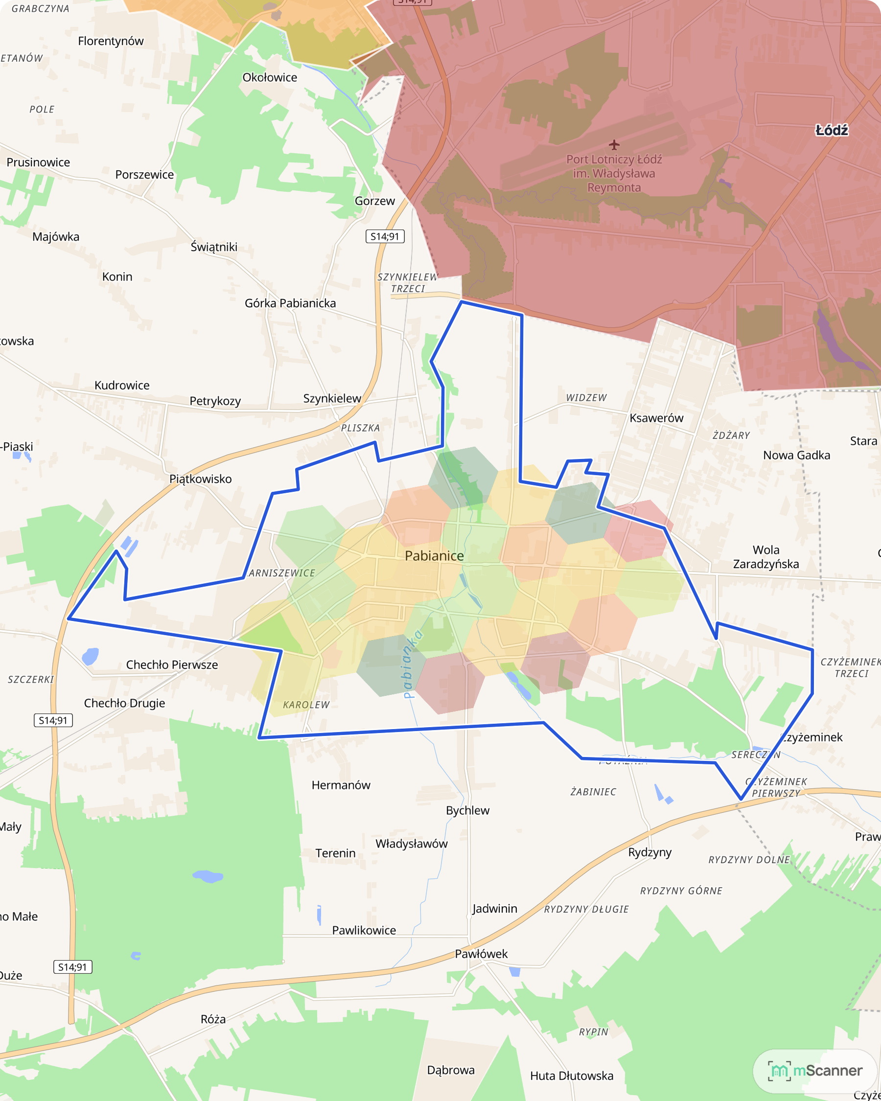 Mapa cen transakcyjnych mieszkań w Pabianicach z niebieskim obrysem granic miasta i siatką heksagonów pokazujących poziom cen, w prawym górnym rogu granica Łodzi