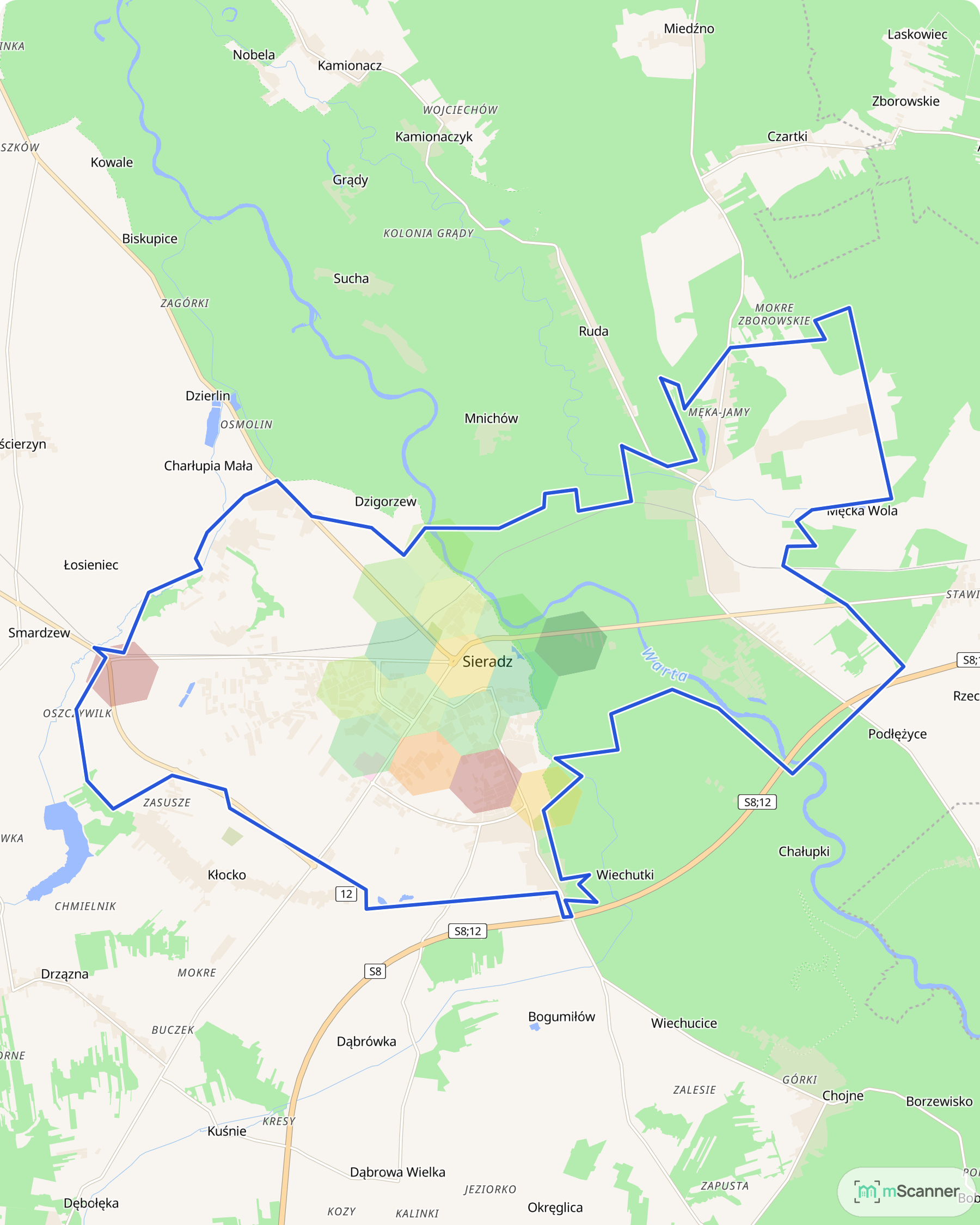 Mapa Sieradza z granicą administracyjną miasta zaznaczoną niebieską linią i sześciokątnymi polami cen transakcyjnych w kolorach od zielonego do czerwonego, skupionymi w centrum miasta nad Wartą