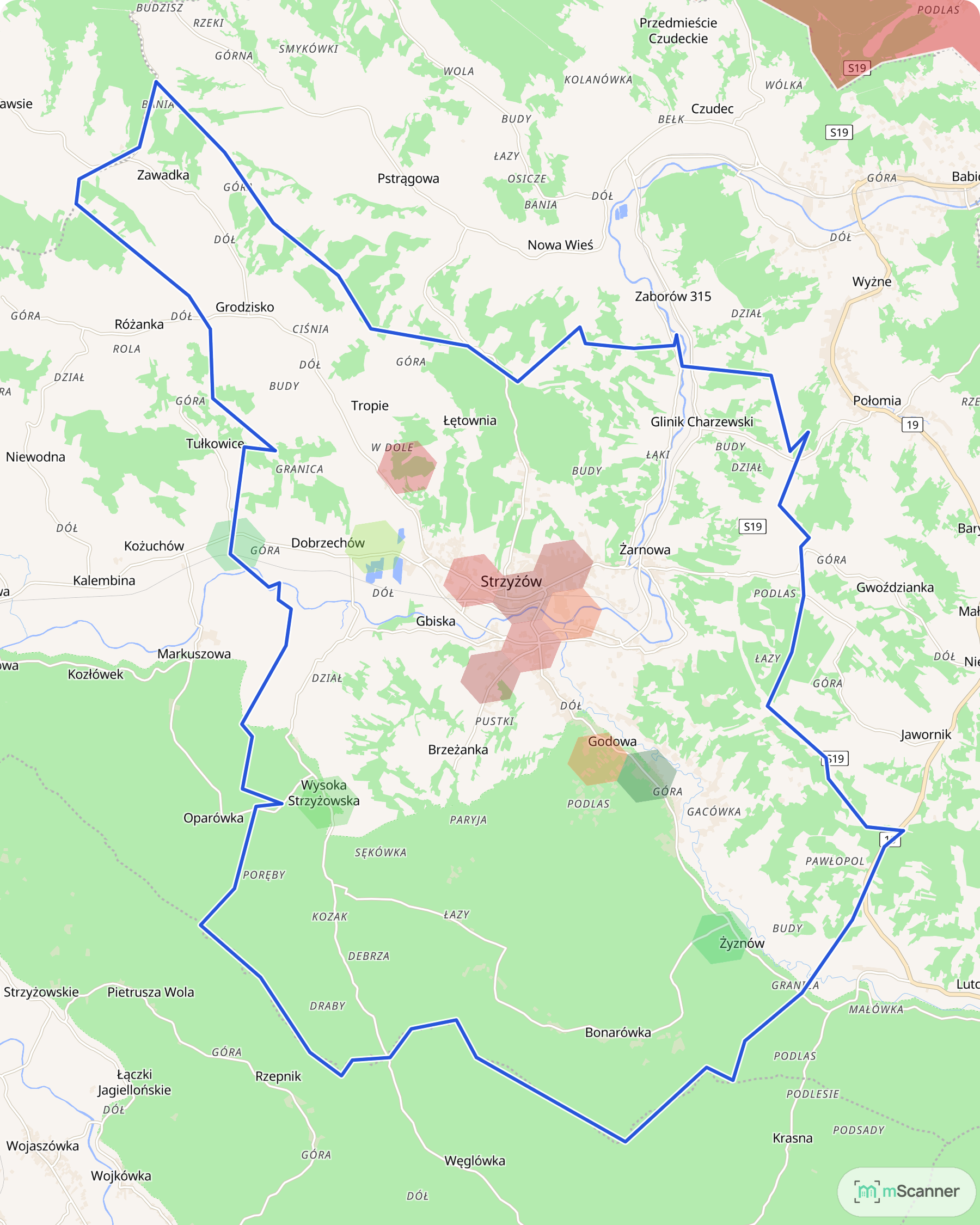 Mapa gminy Strzyżów z niebieską granicą administracyjną i sześciokątami pokolorowanymi według mediany ceny transakcyjnej mieszkań, w dolinie Wisłoka