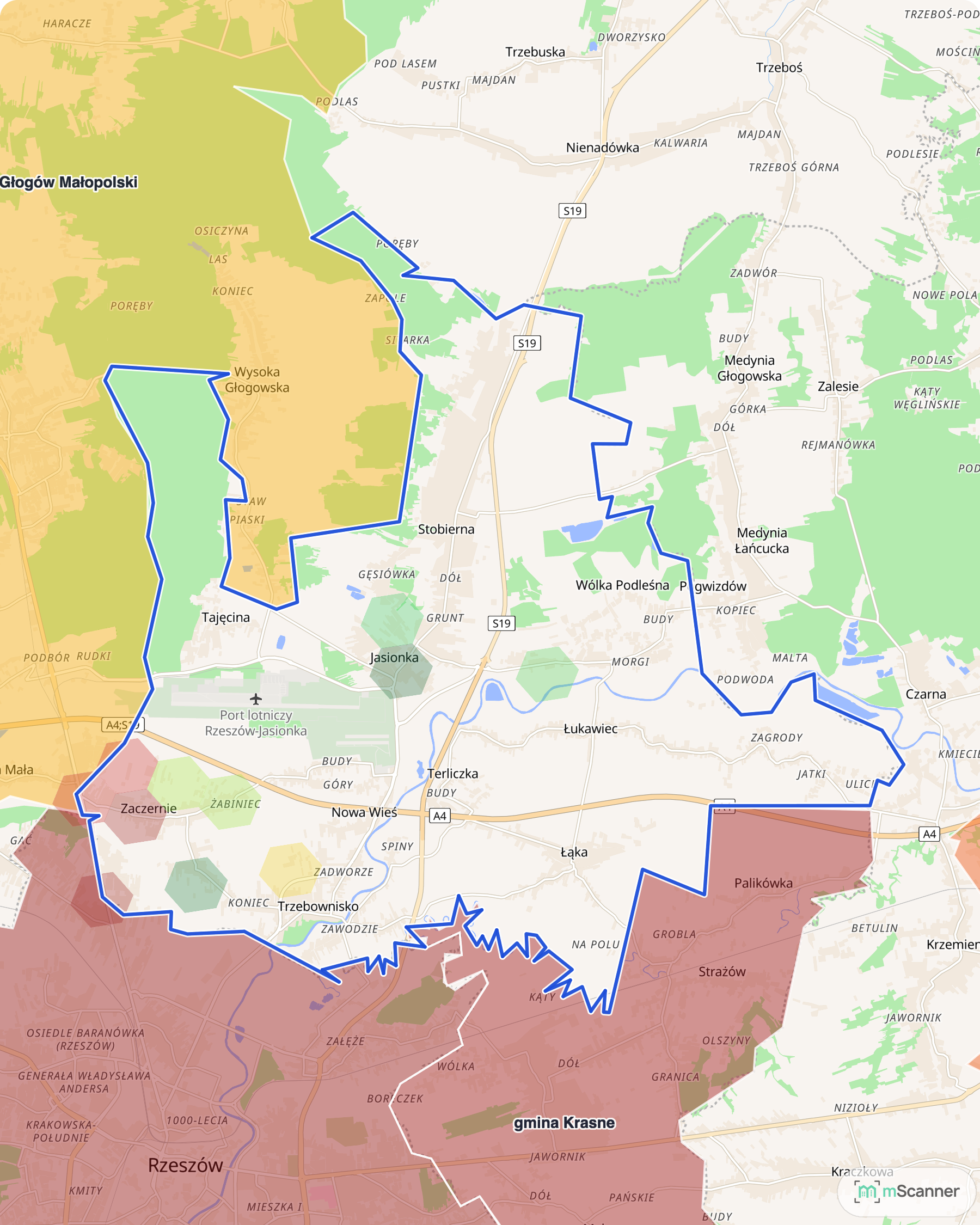 Mapa gminy Trzebownisko z niebieską granicą administracyjną i sześciokątami pokolorowanymi według mediany ceny transakcyjnej mieszkań, na północ od Rzeszowa wokół lotniska w Jasionce