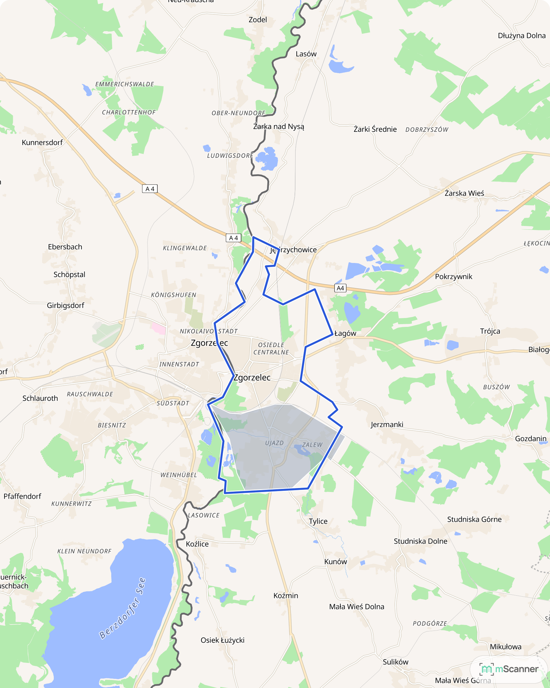 Mapa cen transakcyjnych mieszkań w Zgorzelcu, z niebieskim obrysem granic i kolorowanymi obszarami cen.